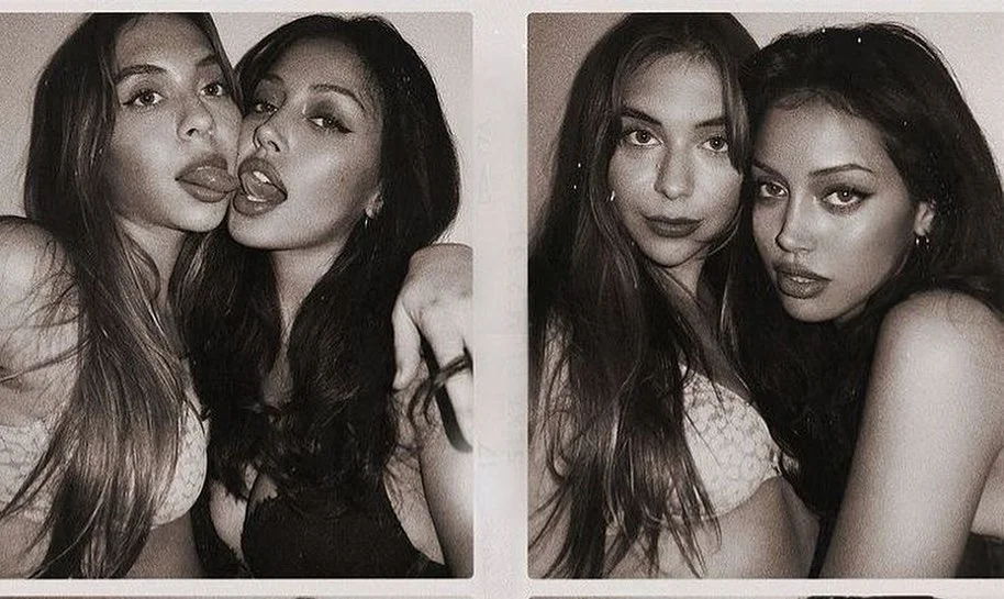 two best friends posing in a photo booth, black and white, female friends