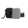compact camera bag with camera in background